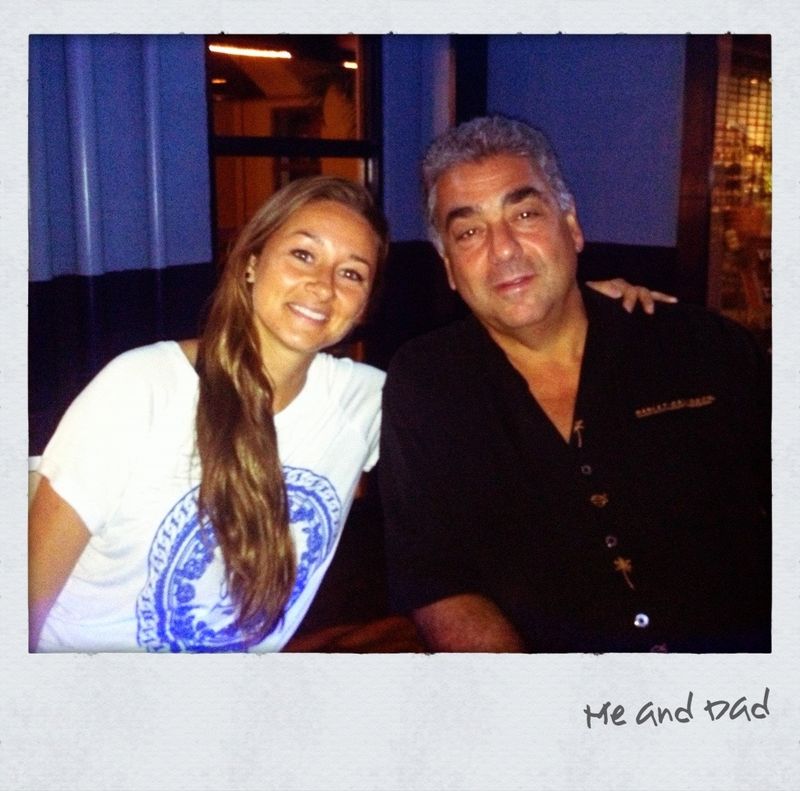 Danielle as an adult sitting beside her father