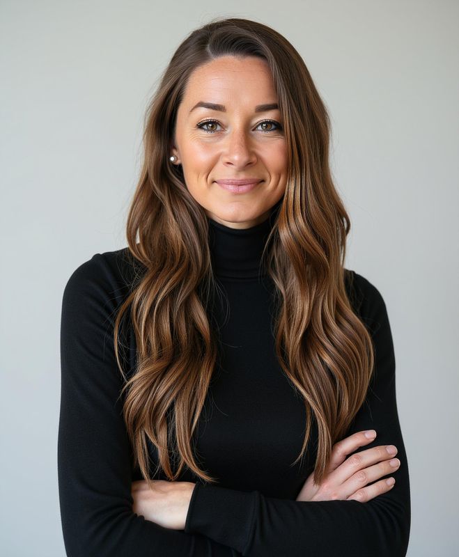Headshot of Danielle Posa in a black turtleneck